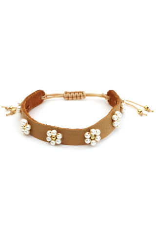 Tan leather flower bead bracelet with pearl and gold details – adjustable handmade boho chic accessory perfect for summer outfits.