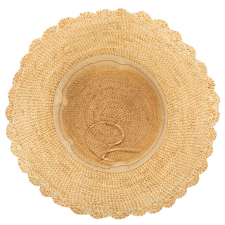 Underside detail shot of tan crochet bucket hat with a scalloped brim. 