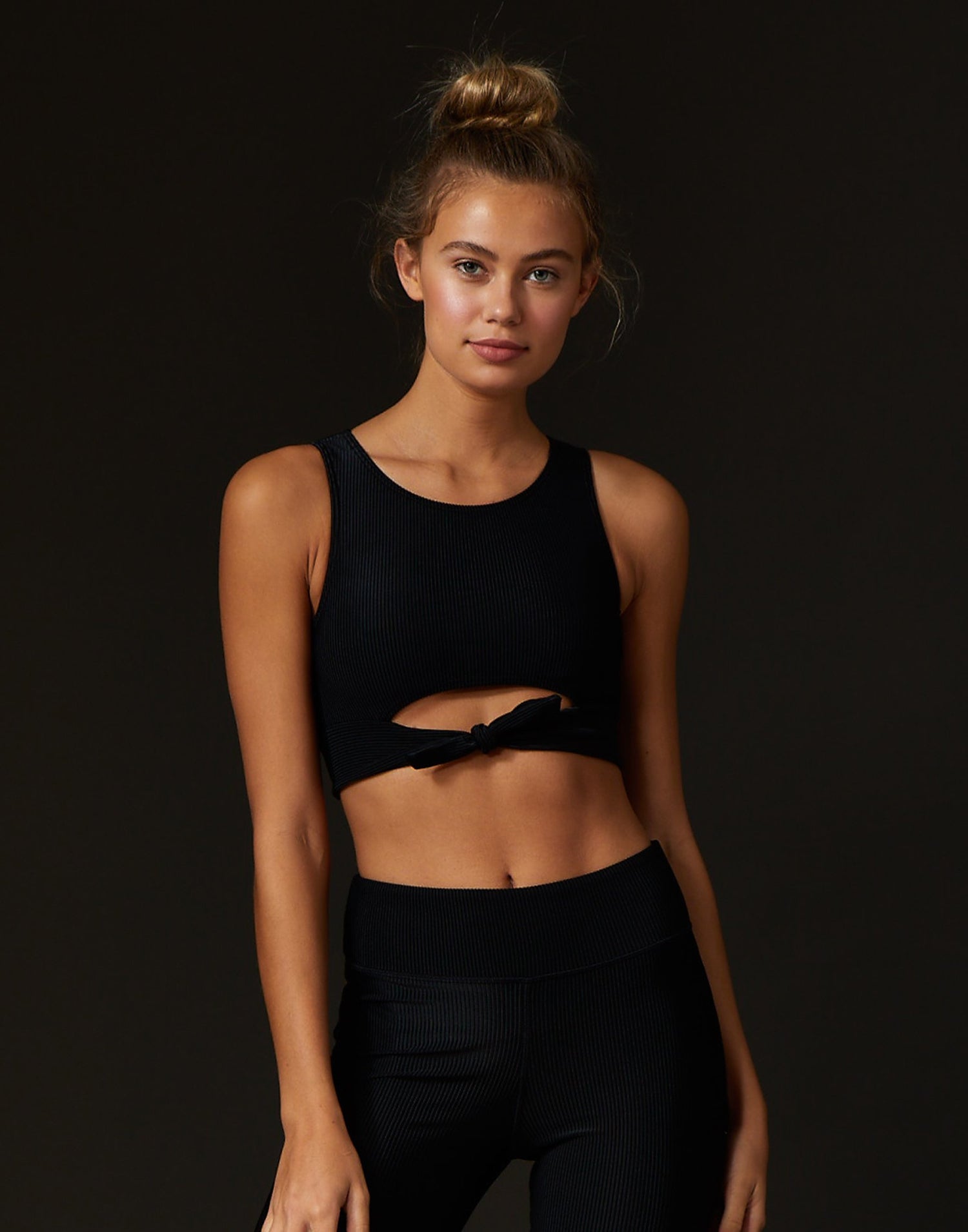 California Kisses Audrey Active Wrap Top in Black with Front Knot Detail - Front View